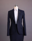 A Navy Blue, pencil stripe, nobility wool blend, business wide notch lapel suit & skirt pant.