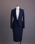 A Navy Blue, dotted pattern, nobility wool blend, business wide notch lapel suit & skirt pant.