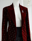 A lipstick red, soaked velvet peak lapel suit with black mikado pencil pant.