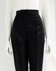 A black mikado pencil cut pant.