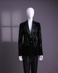 A Charcoal black velvet shawl lapel suit with floral ceramic beads detailing & pencil cut silk pant.