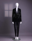 A Charcoal black velvet shawl lapel suit with floral ceramic beads detailing & pencil cut silk pant.