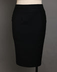 A Charcoal black notch lapel suit with skirt.