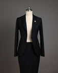 A Charcoal black notch lapel suit with skirt.