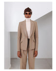 The “Anita” Suit  A Tortilla brown, peak lapel, double breasted jacket & straight pant